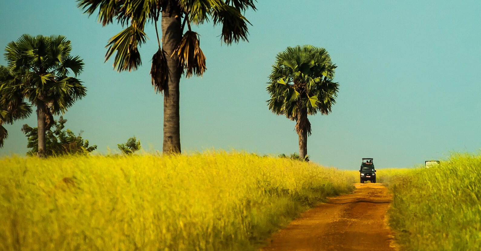 4x4 makes its way through the dirt roads of Uganda.