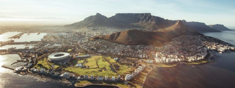Stunning Ariel view of the beauty of Cape Town buildings, landmarks, mountains, ocean and green spaces. In South Africa.