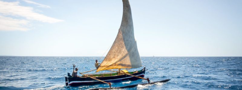 Tsarabanjina Madagascar Luxury African Safari. Sail boat over clear blue waters, luxury experience.