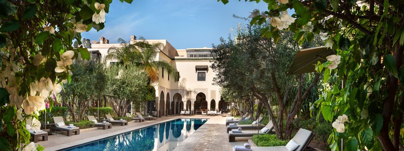 Best poolside experience, decking area, beautiful vegetation and villa exterior. Luxury Villas des orangers