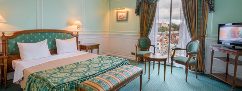 Bedroom in Hotel Colbert Madagascar Antananarivo Hebergement. bedding, furniture luxury villa interior.