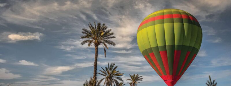 Experience beautiful hot air balloon ride over Morocco on luxury Moroccan safari trip.