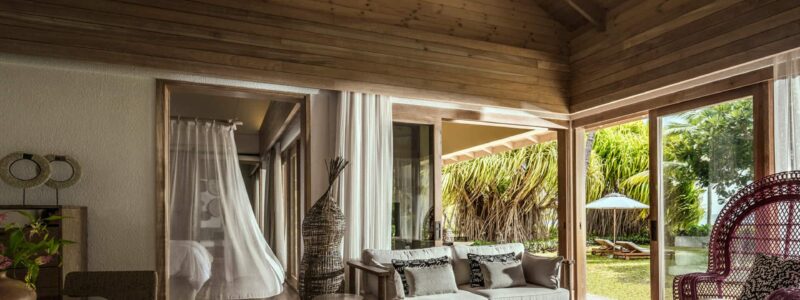 Four seasons luxury villa interior- African decoration, furniture, interior, outside seating area.