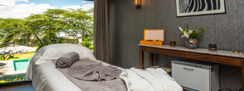 Luxury Kenya Safari The Cliff Massage Area with background of beautiful African trees. With cultural interior.