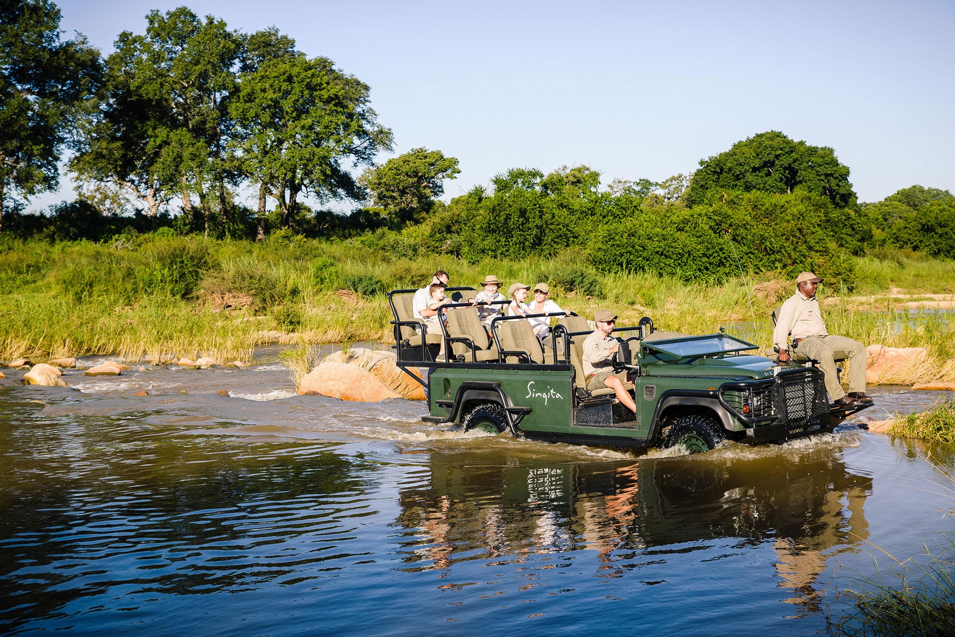 Singita Boulders Lodge, game drive during An African safari with children