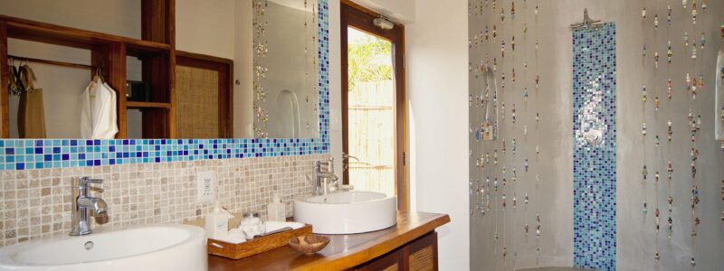 Azura Benguerra Beach Villa Bathroom, African design, appliances, interior, mirror, shower.