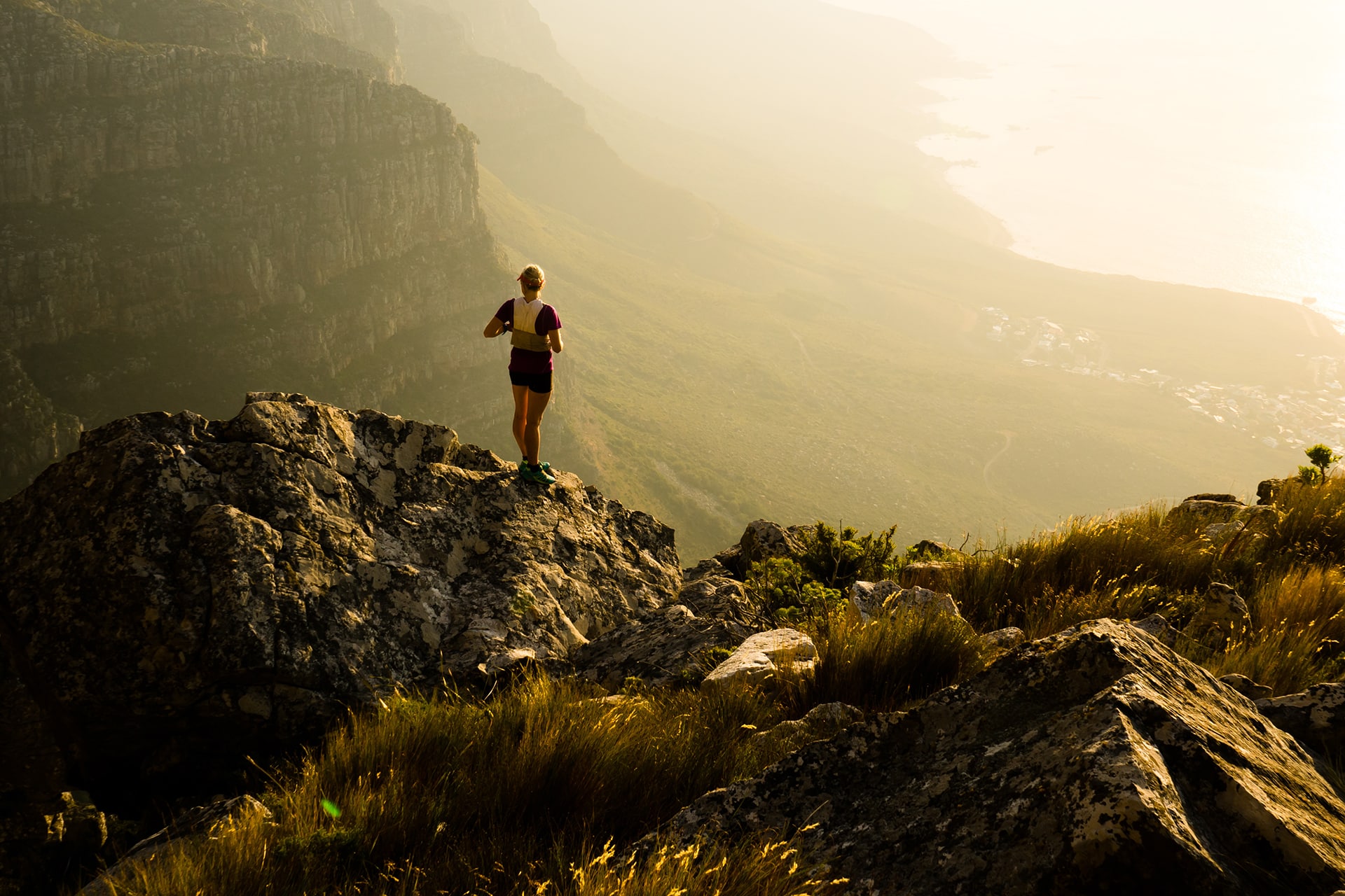 Colorful outdoor table set with traditional North African dishes and artisanal pottery, evoking a sense of mindful living and nourishing cuisine on a wellness-focused journey in Africa.