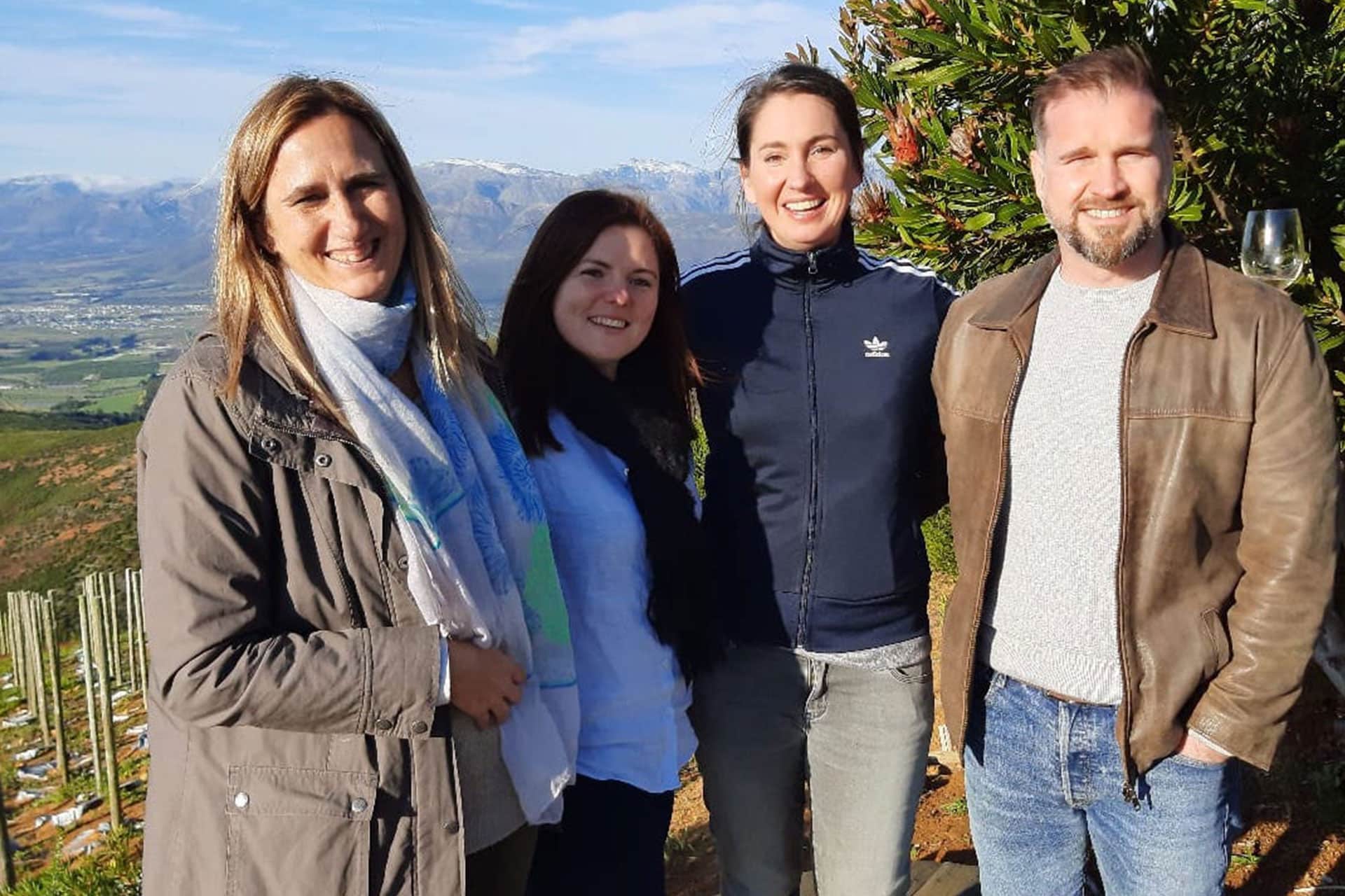 A group of people at Babylonstoren Wine Farm in Cape Town