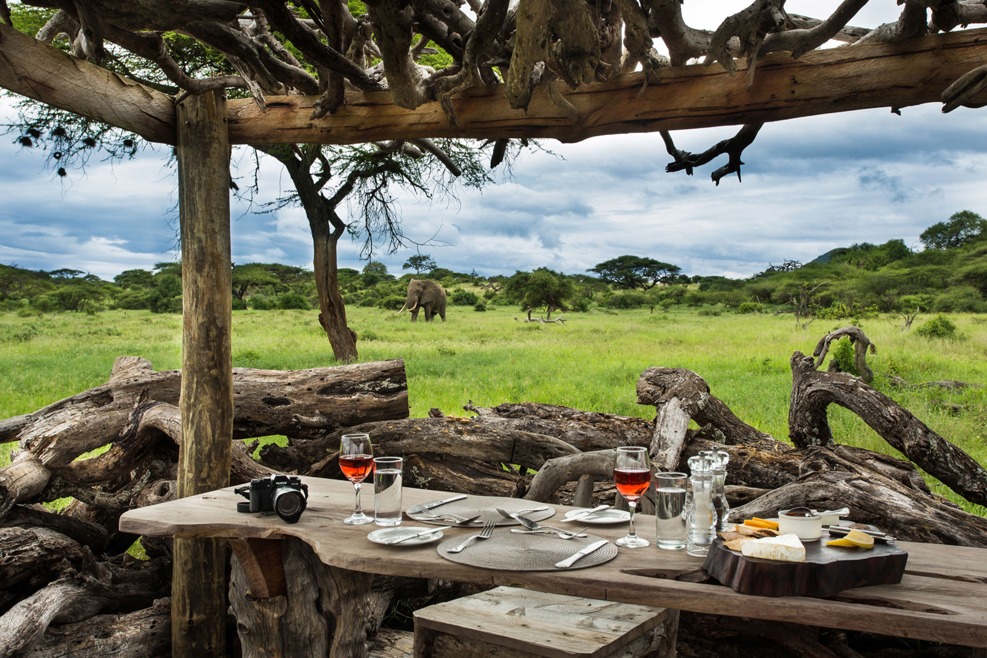 Wine and a cheese board set up in the hide at Ol Donyo