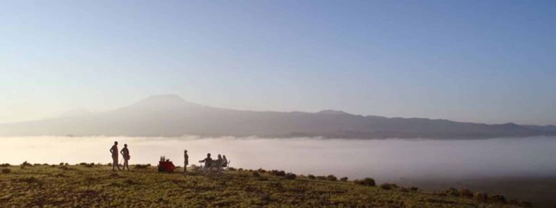 Tortilis-Camp---Drinks-in-front-of-Kilimanjaro