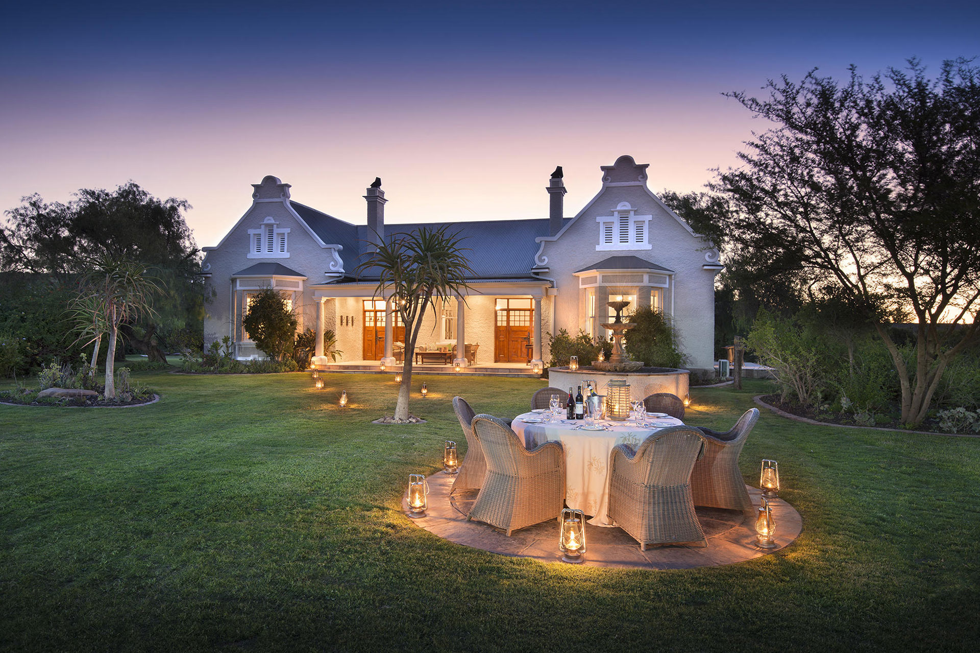 The lawns and facade of Uplands Homestead at Kwande