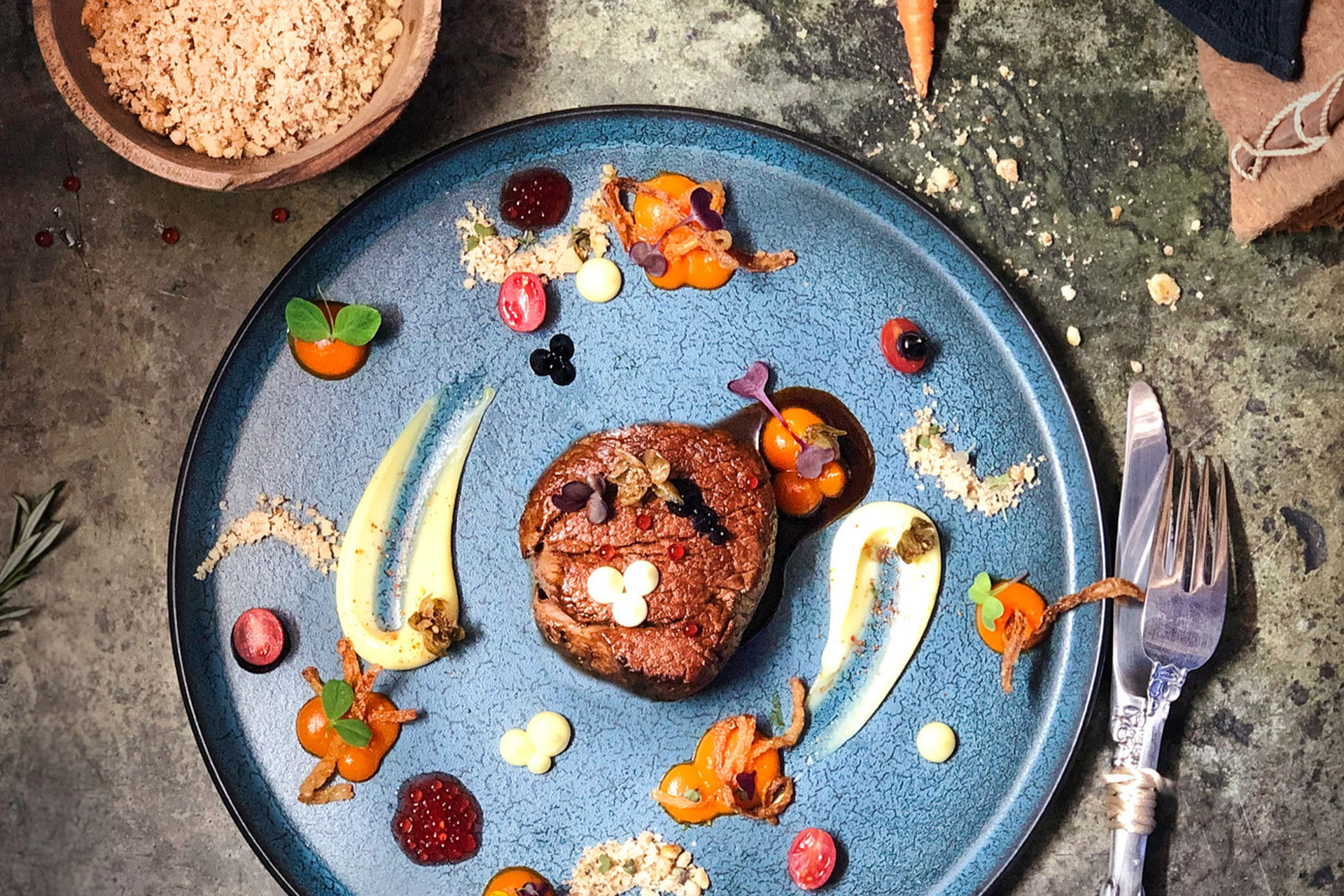 A beef fillet and accompaniments on a plate at Homespun by Matt &ndash; one of the top 10 fine dining restaurants in Cape Town.