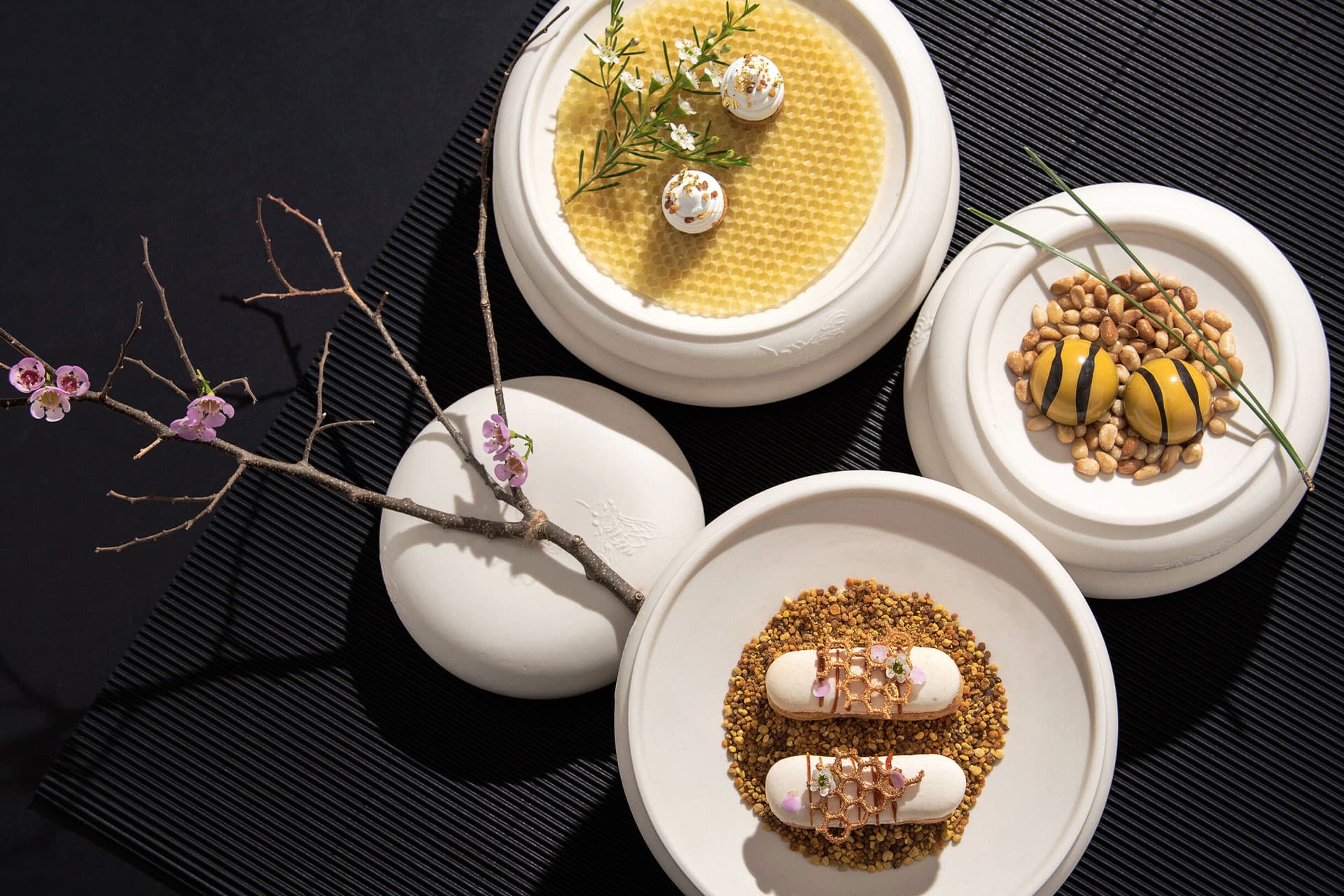 A selection of three desserts at La Colombe fine dining restaurant in Cape Town.