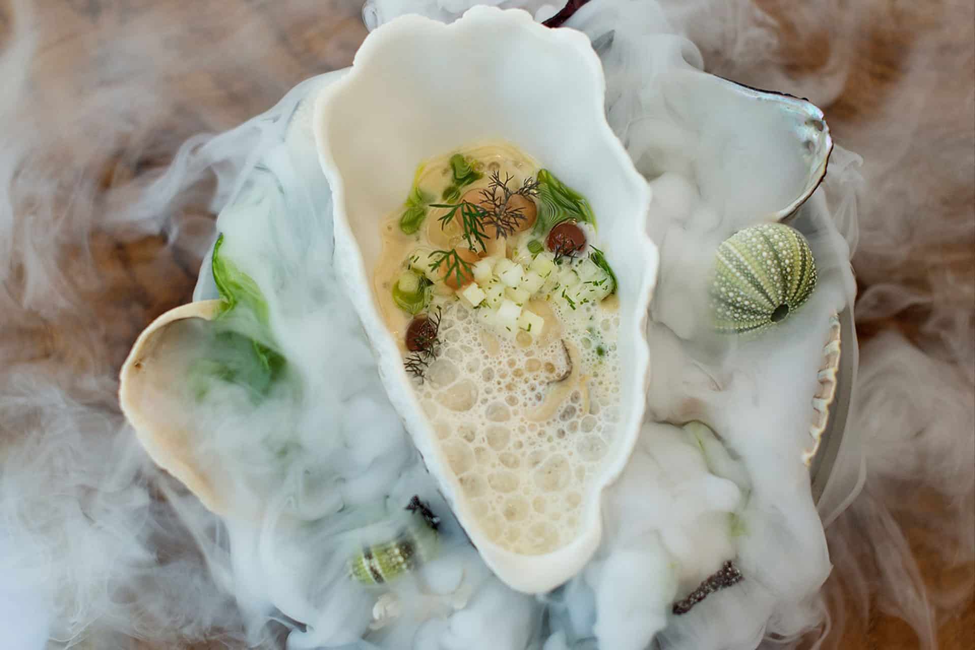 A contemporary plated seafood dish at PIER &ndash; one of the top 10 fine dining restaurants in Cape Town. 