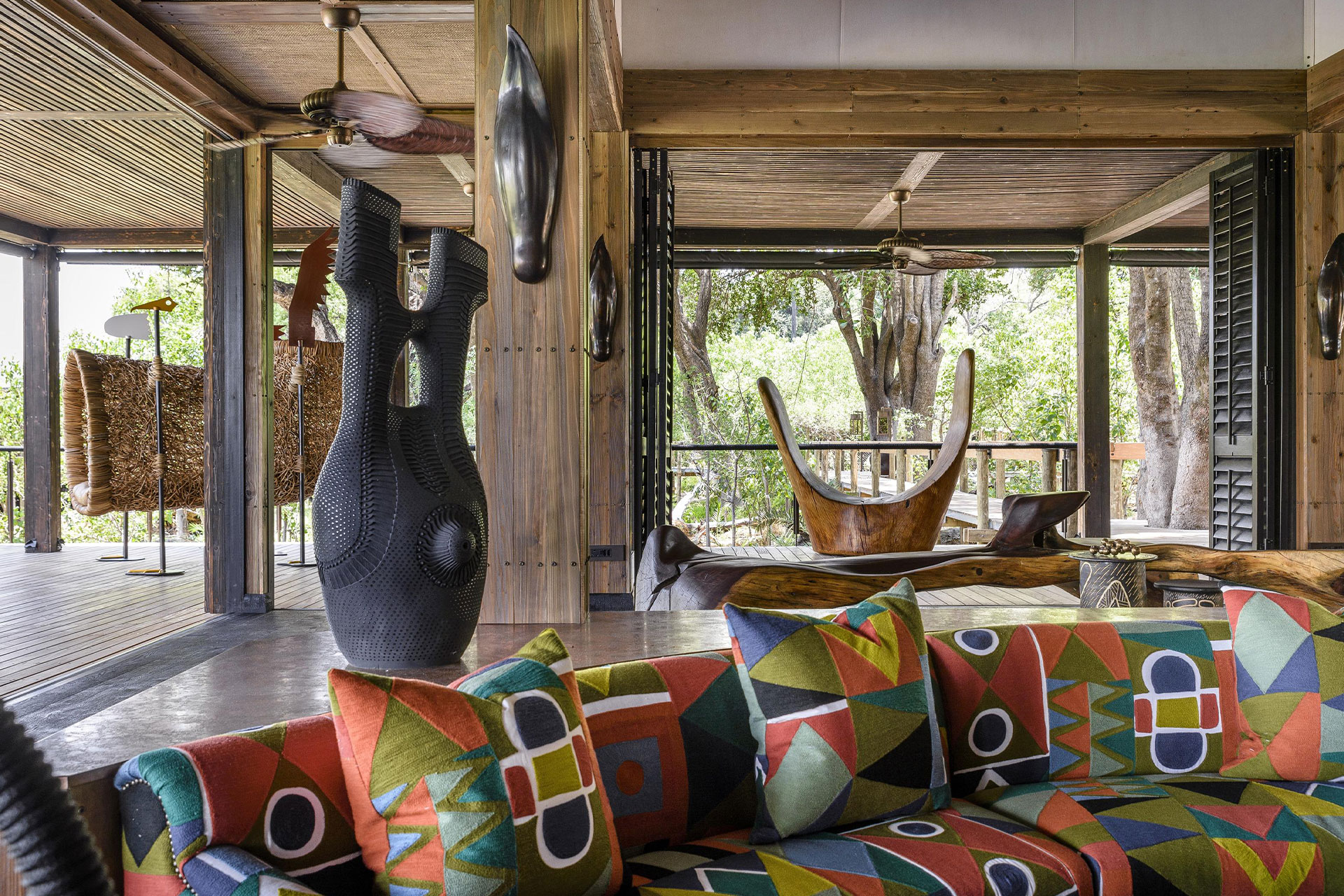 The deck and outdoor seating at Xigera Safari Lodge in Botswana. 