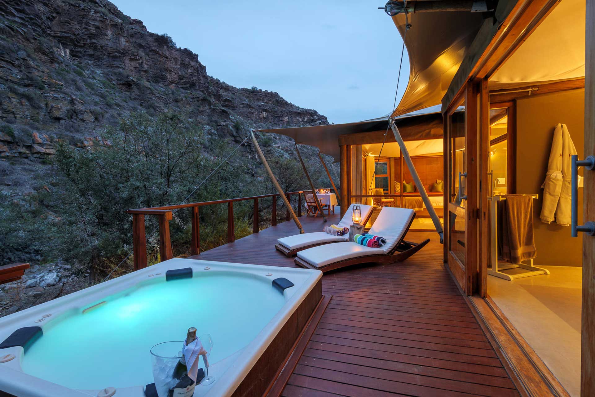 En-suite tent with a private jacuzzi at Dwyka Tented Lodge.