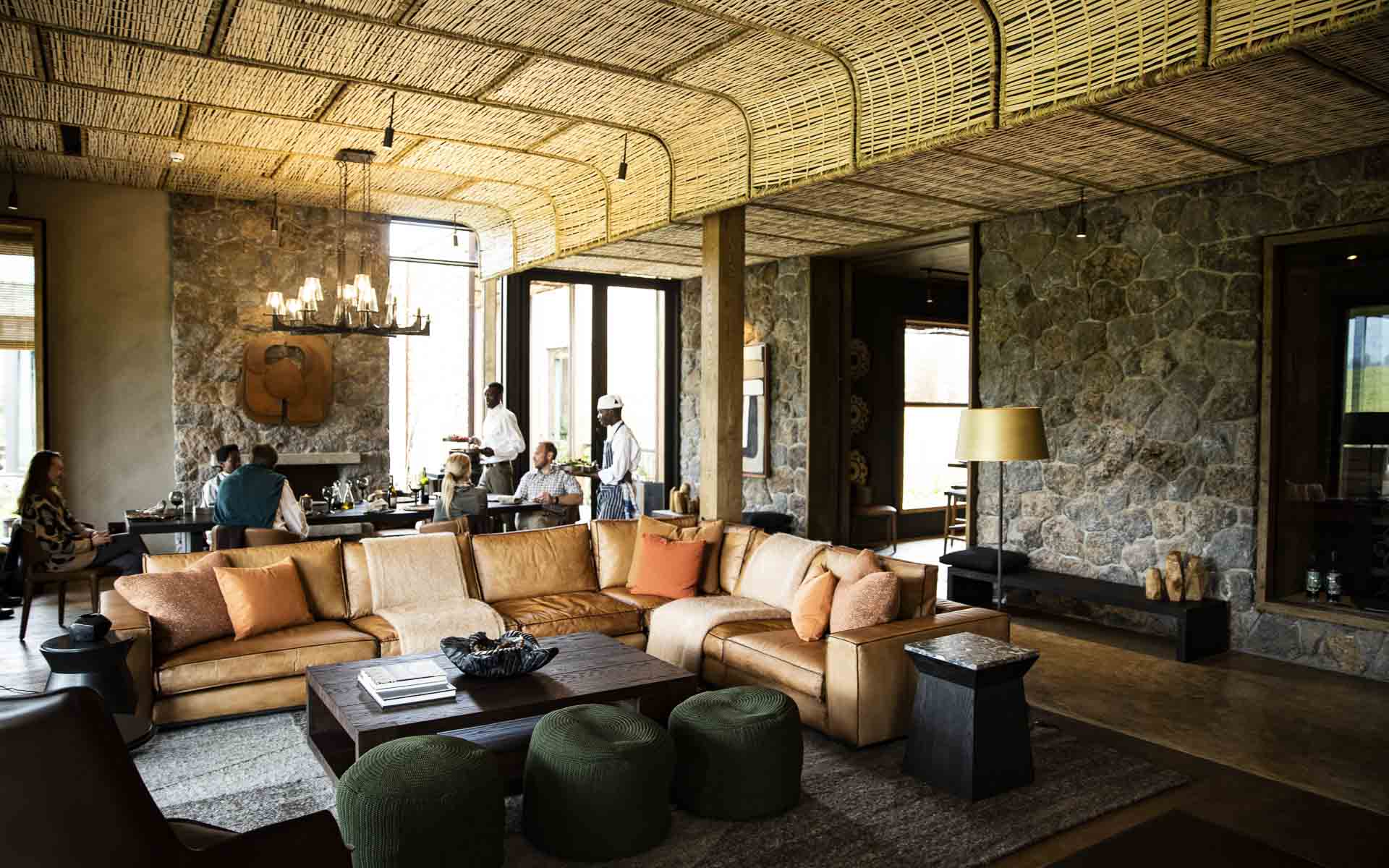 A look at Kataza House&rsquo;s stunning lounge area while guests are served by dedicated staff - one of the top villas in Africa. 