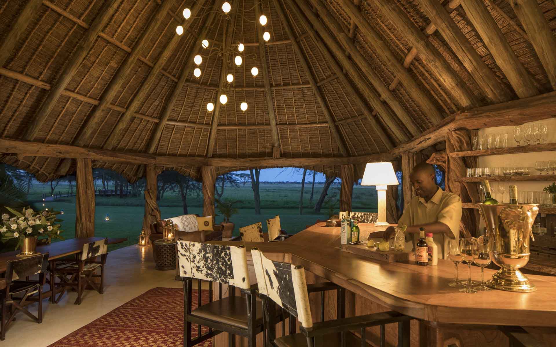 The barman preparing a delicious cocktail at Sirikoi House - one of the top villas in Africa. 
