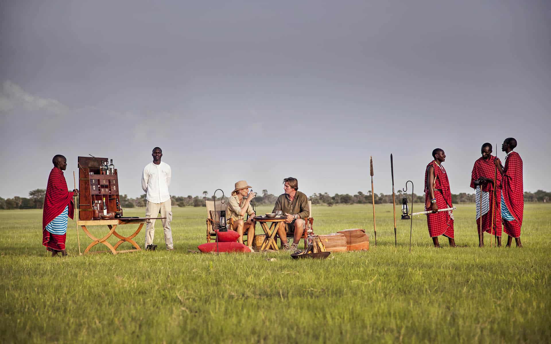 A couple enjoy romantic sundowners at Chem Chem in Tarangire National Park, part of Ker & Downey Africa&rsquo;s best Africa safaris of 2022. 