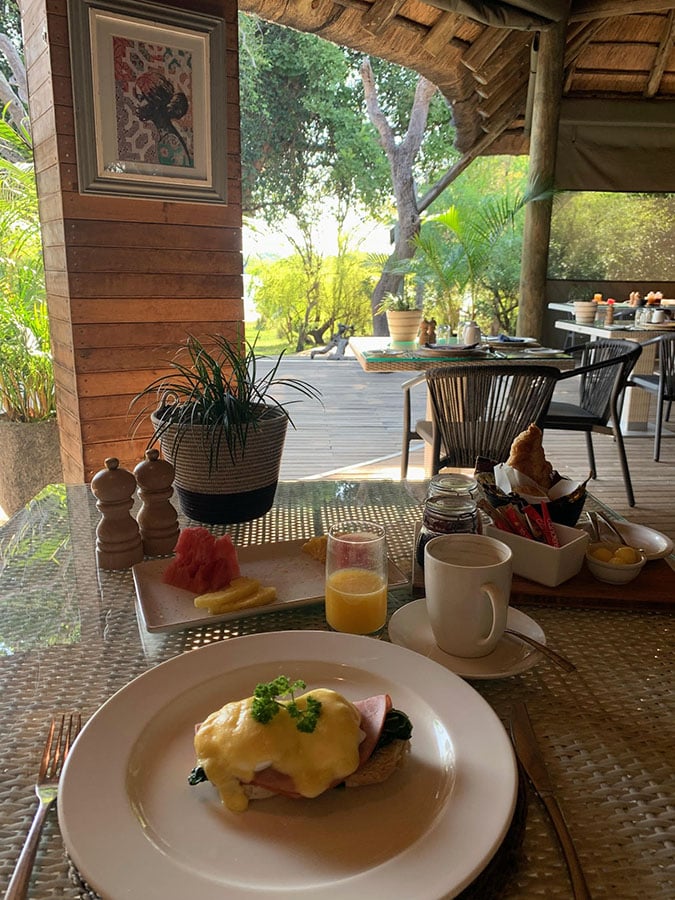 Eggs benedict served at Victoria Falls River Lodge