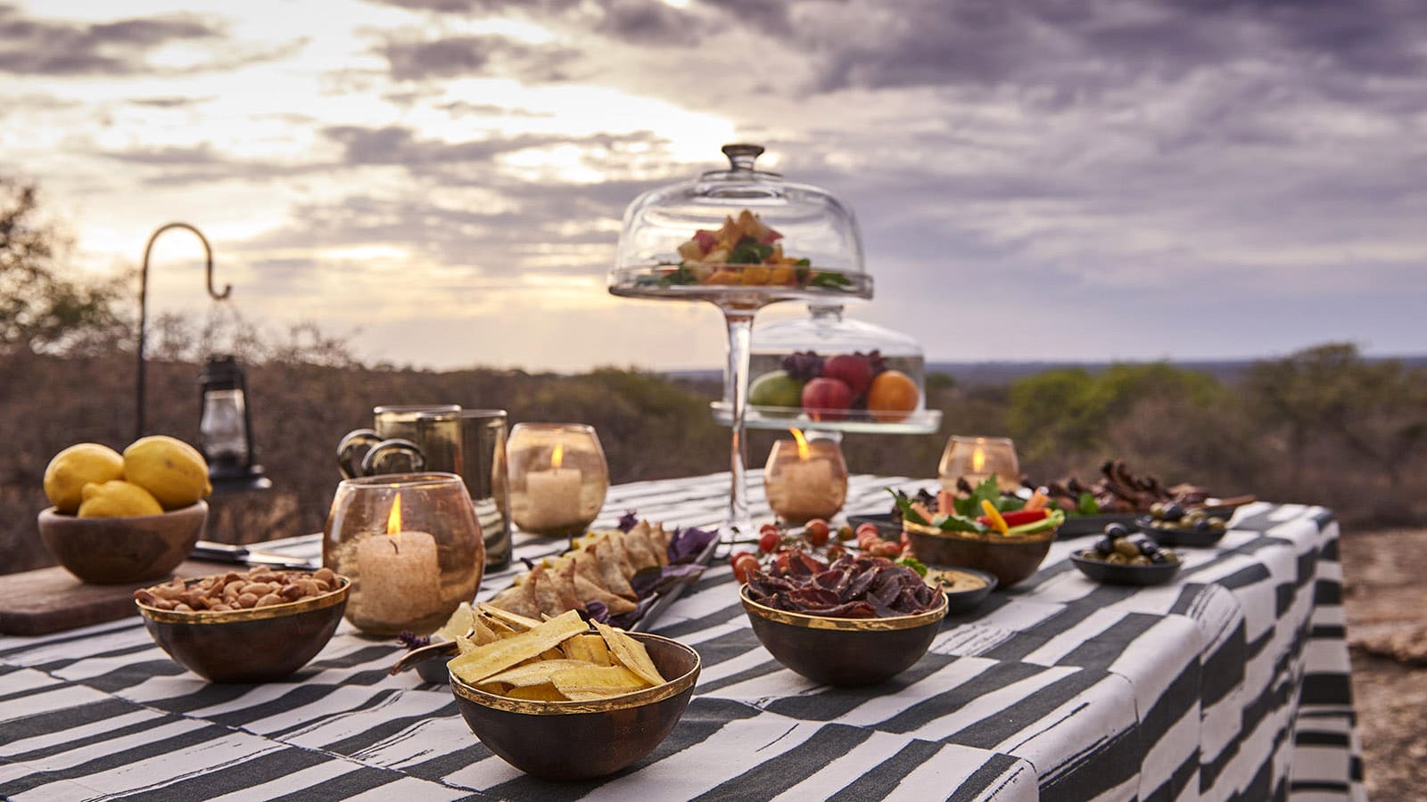 Safari sundowner table set up at Mwiba Lodge with Ker & Downey Africa