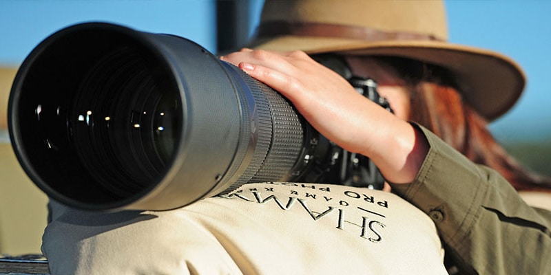 A photographer on safari at Shamwari with Ker & Downey Africa