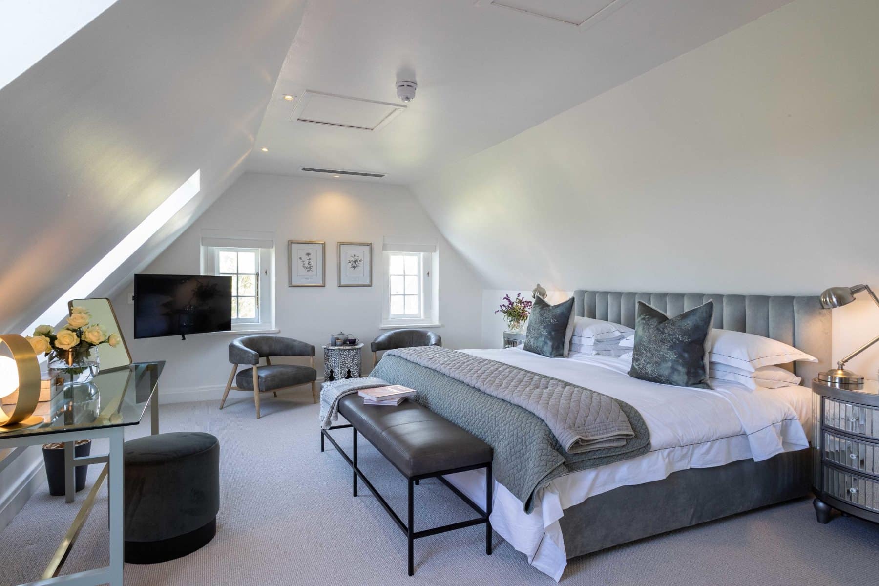 King size bedroom in the one-bedroom suite at Steenberg Hotel & Spa with Ker & Downey Africa