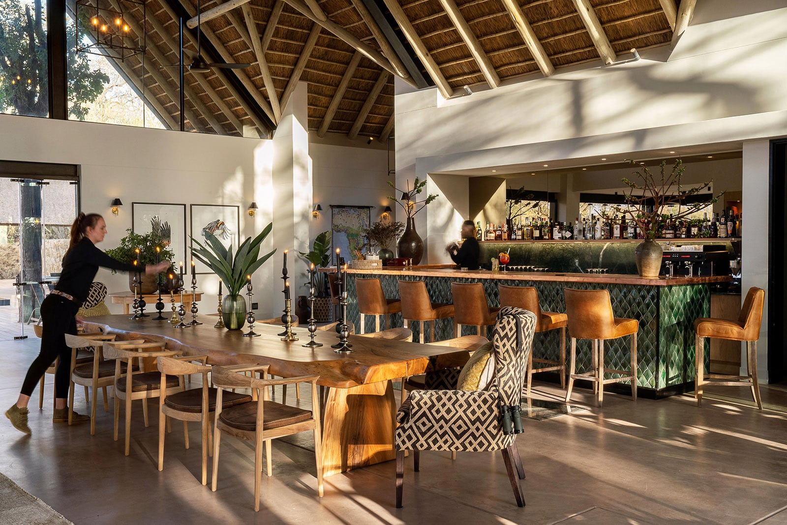 Lounge and bar area in the main public areas at Monwana Game Lodge with Ker & Downey Africa